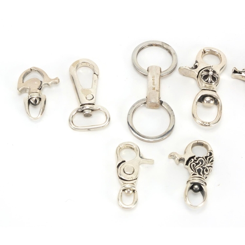 2506 - Eight silver key chain clasps, each stamped 925, the largest 7cm in length, approximate weight 164.5... 
