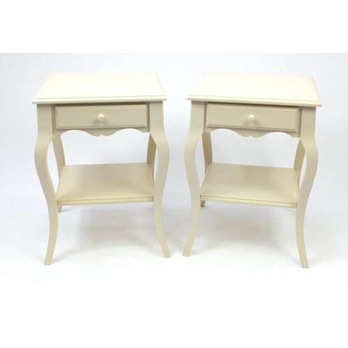 32 - Pair of cream painted bedside chests, raised on cabriole legs, 67cm H x 48cm W x 48cm D