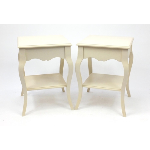 32 - Pair of cream painted bedside chests, raised on cabriole legs, 67cm H x 48cm W x 48cm D
