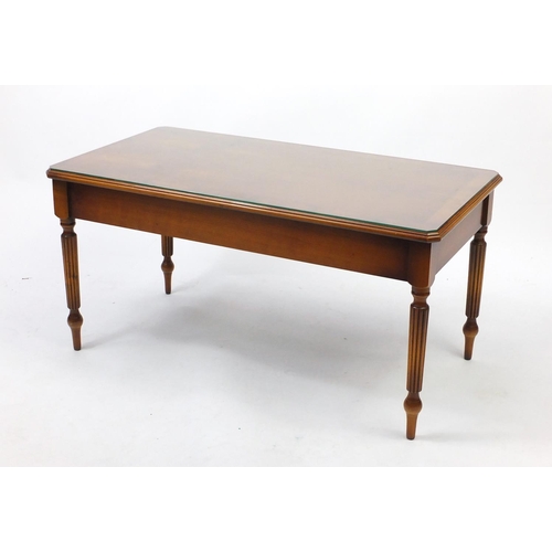 40 - Rectangular inlaid yew coffee table, 48cm H x 96cm W x 50cm D