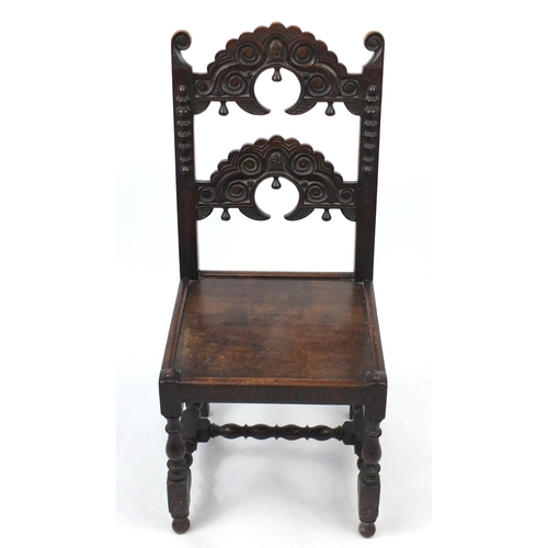 36 - Antique carved oak hall chair
