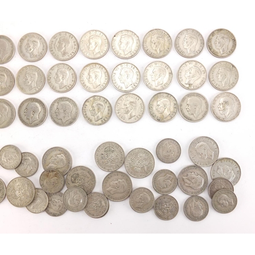 2585 - British pre decimal pre 1947 one and two shillings, approximate weight 560.0g