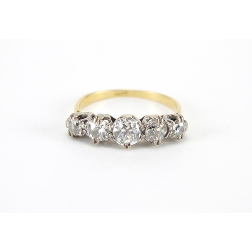2609 - 18ct gold diamond five stone ring, size M, approximate weight 2.3g