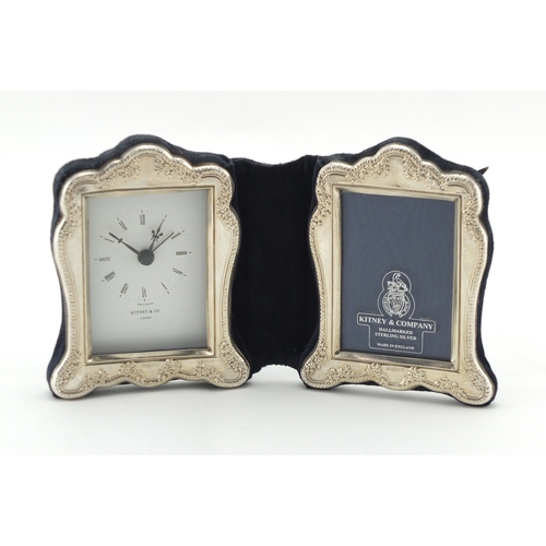 2472 - Folding silver alarm clock and photo frame, embossed with flowers by Kitney & co, 12cm x 20cm