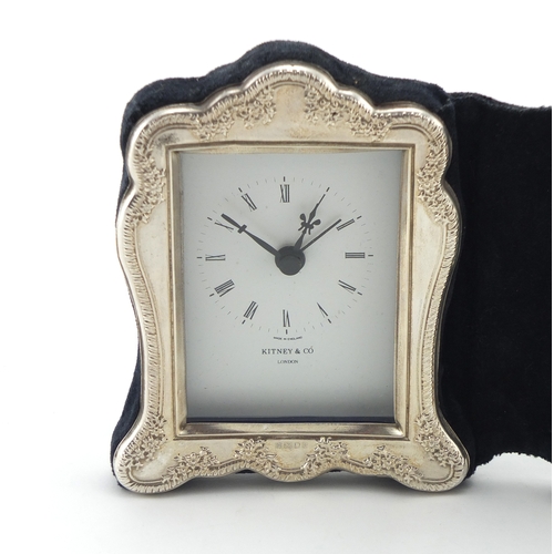 2472 - Folding silver alarm clock and photo frame, embossed with flowers by Kitney & co, 12cm x 20cm