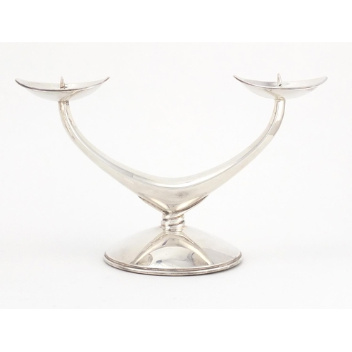 2476 - Pair of Danish silver two branch candelabra, each stamped 835 WTB, 11cm high x 19cm wide, approximat... 