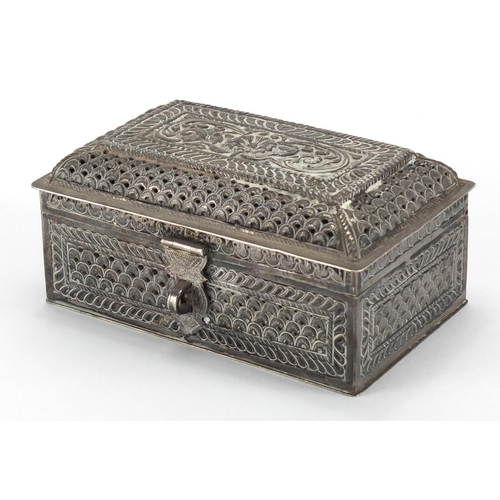 2479 - Rectangular Middle Eastern silver casket, pierced embossed with flowers, impressed marks and paper l... 