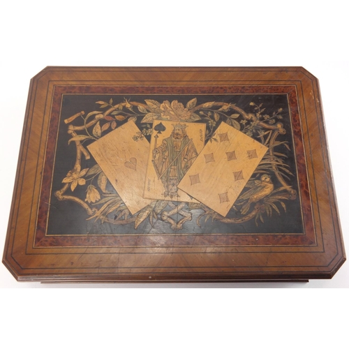 2181 - Italian Sorrento games box, the hinged lid inlaid with amboyna and ebony decorated with paying cards... 