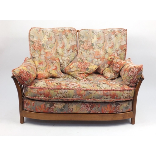 3 - Ercol Renaissance two seater settee, with floral upholstered lift off cushions, approximately 140cm ... 