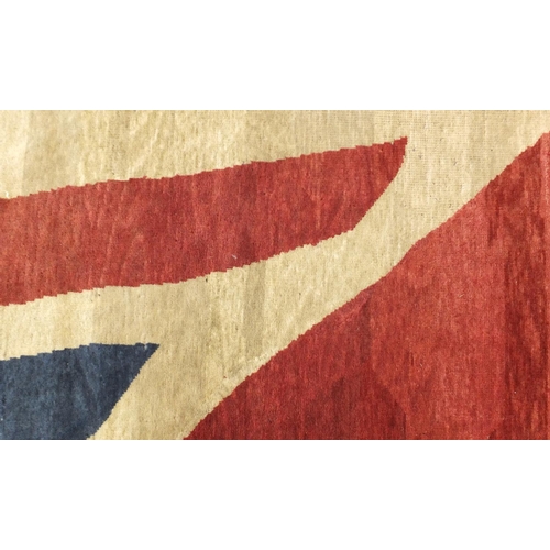 10 - Contemporary hand knotted Union Jack design rug, 277cm x 181cm