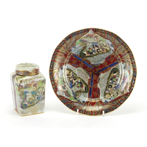 2304 - Wilton Ware lustre plate and flat sided jar with cover, each decorated with figures, the largest 22.... 