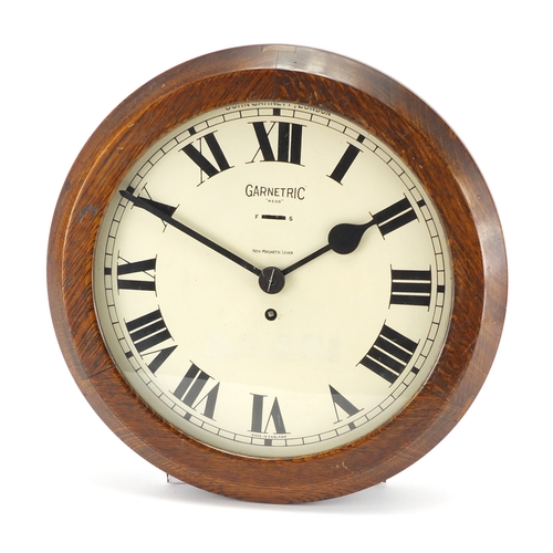 2035 - Oak cased Garnetric clock by John Garnett of London, 37cm in diameter
