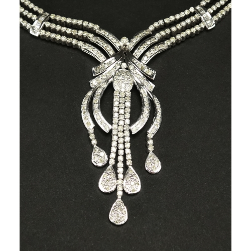 2602 - Good 18ct White gold diamond cocktail necklace and matching earrings, approximately 7.52 carats of d... 