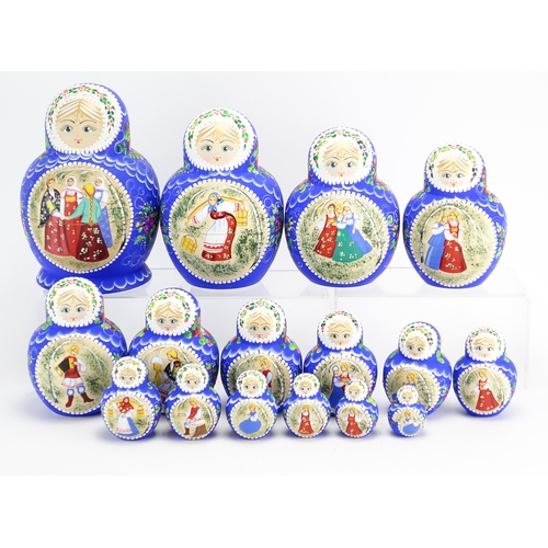 2065 - Russian Matryoshka stacking doll, hand painted with figures enclosing twenty eight dolls, two inscri... 