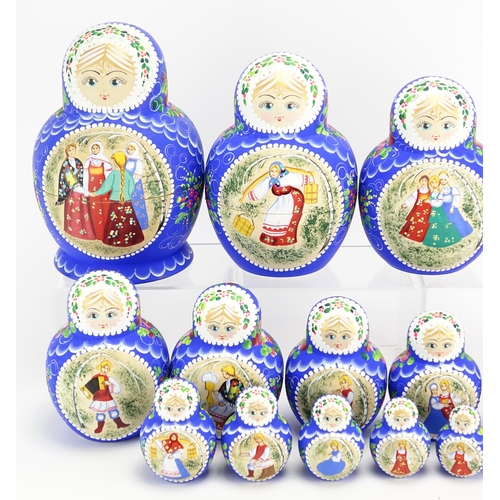 2065 - Russian Matryoshka stacking doll, hand painted with figures enclosing twenty eight dolls, two inscri... 
