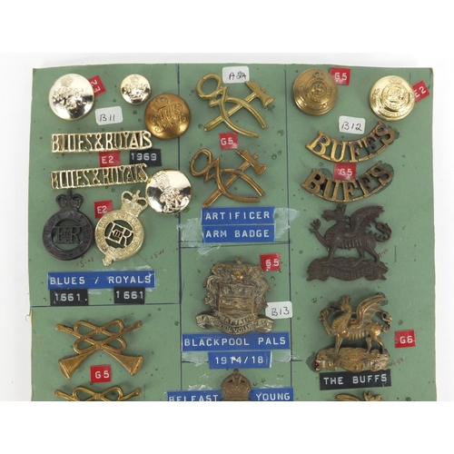 1039 - Sheet of Military interest cap badges and buttons  including Buglers Blackpool Pals and The Buffs
