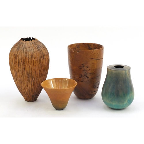 2099A - Four handmade wooden vases, three signed, the largest 20cm high