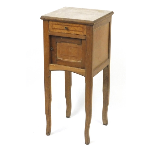 32 - French inlaid oak and walnut side table, fitted  with marble top above frieze drawer and cupboard do... 