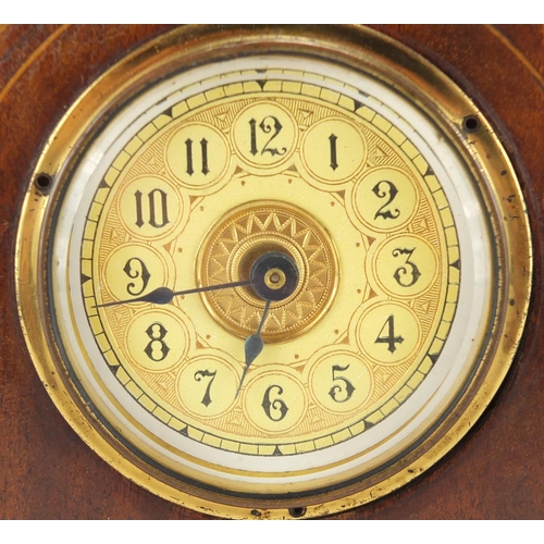 128 - Inlaid mahogany mantel clock, with ornate gilt dial, 26cm wide