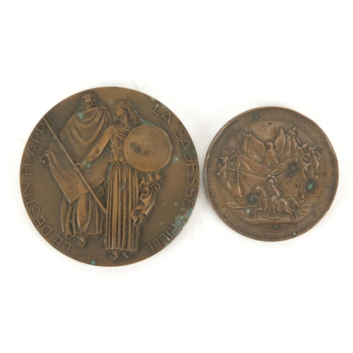 625 - Two French bronze commemorative medallions, the largest 7cm in diameter