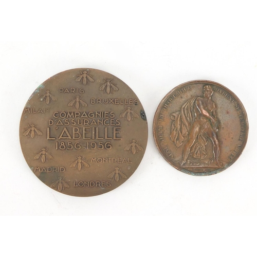 625 - Two French bronze commemorative medallions, the largest 7cm in diameter