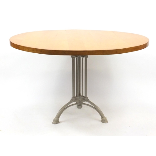 14 - Circular maple dining table, with cast iron base, 76cm high x 120cm in diameter