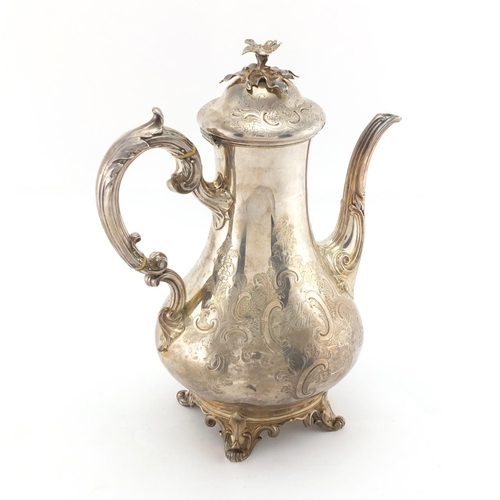 604 - Victorian silver coffee pot, with ivory banded handle, floral knop, engraved with flowers and foliag... 