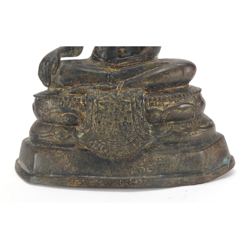 463A - Thai patinated bronze figure of seated Buddha, 24cm high