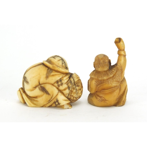 431 - Two Japanese carved ivory Netsukes of fisherman, the largest 4cm high