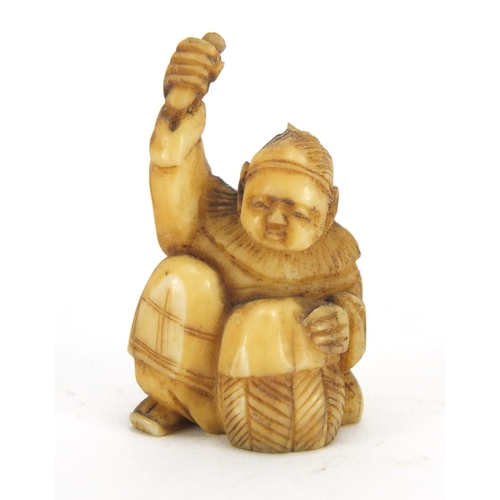 431 - Two Japanese carved ivory Netsukes of fisherman, the largest 4cm high
