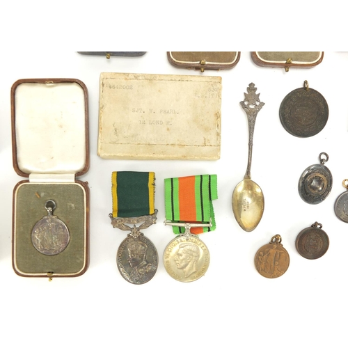 220 - British Military World War II medal group relating to SJT W Pearl, Territorial Efficient Service med... 