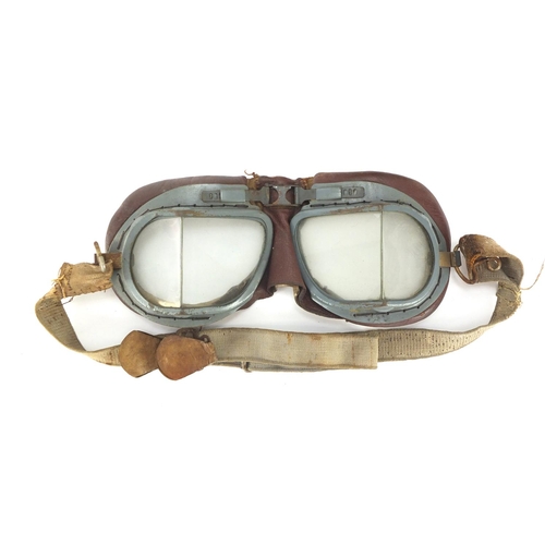 92 - AA Telegram Fanum car radiator badge and a pair of driving goggles, the badge numbered 46501, 14cm h... 