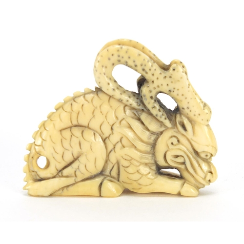 427 - ** WITHDRAWN FROM SALE ** Japanese carved ivory netsuke of a dragon, character marks to the base, 4.... 
