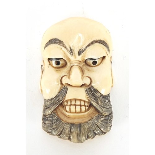 417 - Japanese carved ivory Noh Mask netsuke, character marks to the reverse, 5.5cm high