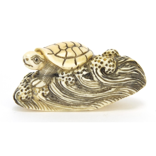 422 - ** WITHDRAWN FROM SALE ** Japanese carved ivory netsuke of a tortoise on waves, character marks to t... 