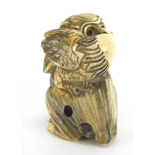 438 - ** WITHDRAWN FROM SALE ** Japanese carved ivory netsuke of a monkey and bird, character marks to the... 