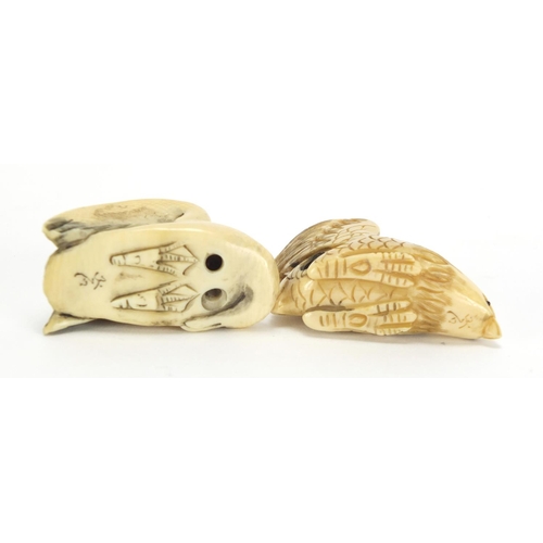 439 - ** WITHDRAWN FROM SALE ** Two Japanese carved ivory netsuke's of an eagle and swan, each with charac... 