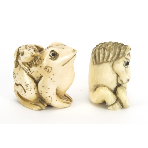 443 - ** WITHDRAWN FROM SALE ** Two Japanese carved ivory netsuke's one of two frogs the other of Pegasus,... 