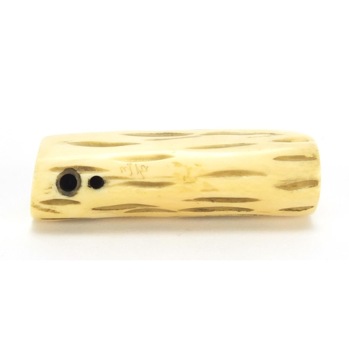 432 - ** WITHDRAWN FROM SALE ** Japanese carved ivory netsuke of a two rats on a trunk, character marks to... 
