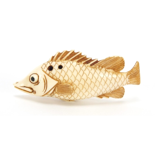 436 - Japanese carved ivory netsuke of a fish, character marks to the base, 7.3cm in length