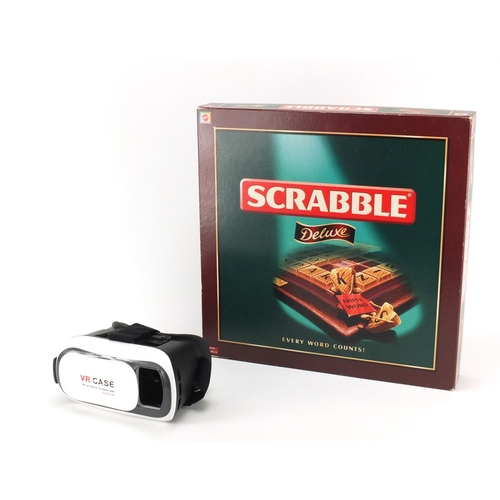 450 - Scrabble Deluxe board game and a set of virtual reality glasses