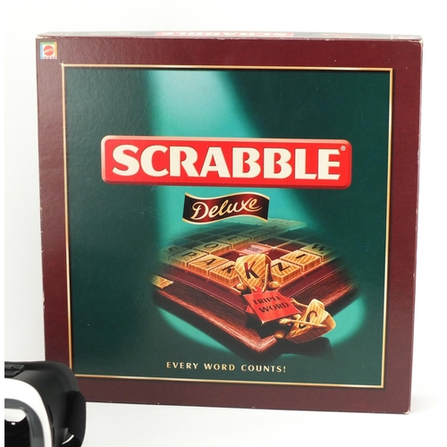 450 - Scrabble Deluxe board game and a set of virtual reality glasses