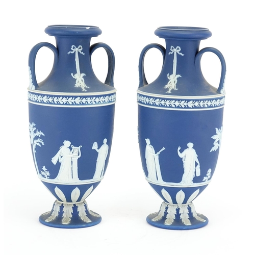 507 - Pair 19th century Wedgwood Jasper Ware vases with twin handles, each decorated in low relief with fo... 