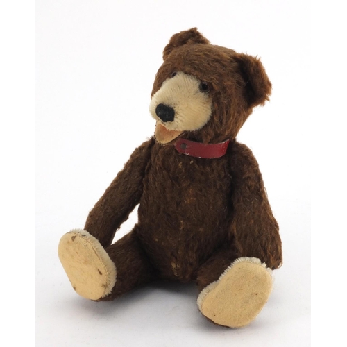 441 - Vintage German straw filled teddy bear, with glass bead eyes and articulated limbs, 22cm high