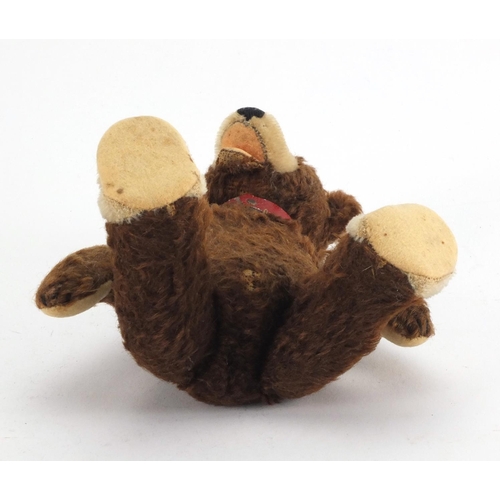 441 - Vintage German straw filled teddy bear, with glass bead eyes and articulated limbs, 22cm high