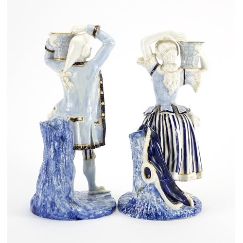 505 - Pair of 19th century Royal Worcester hand painted porcelain figural candlesticks, modelled as male a... 