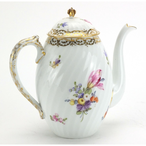 116 - Continental porcelain teapot, hand painted and gilded with flowers, 20cm high