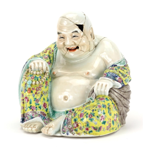 273 - Chinese porcelain figure of seated Buddha wearing a robe, finely hand painted with famille rose pale... 