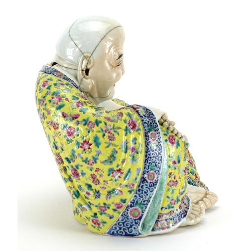 273 - Chinese porcelain figure of seated Buddha wearing a robe, finely hand painted with famille rose pale... 