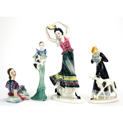 562 - Four Art Deco hand painted pottery figurines, the largest of a Spanish dancer, each with impressed m... 